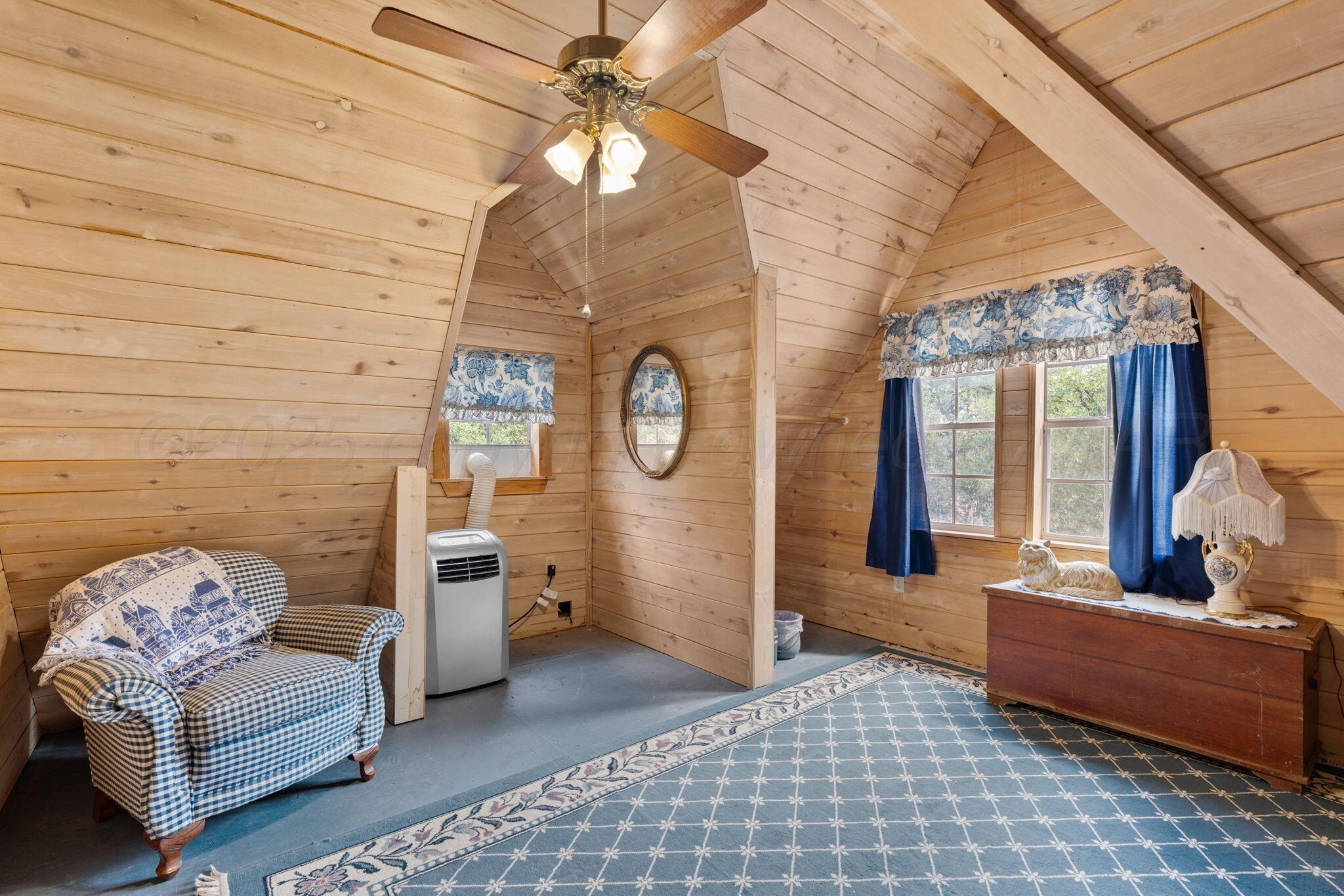 2403 Maple Lane Kingsland, TX 78639 - Photo 9 of 46 a living room with furniture and a fireplace