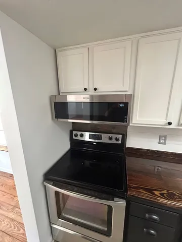 a kitchen with a sink and a window