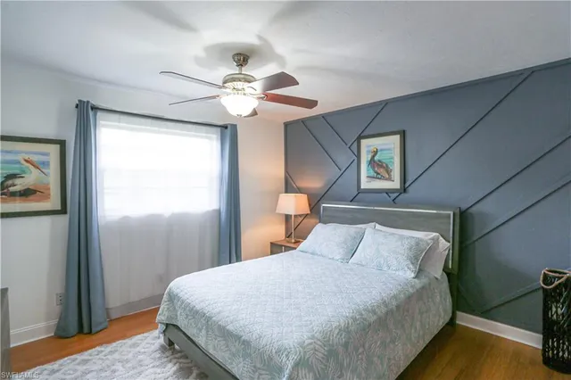 a bedroom with a bed and a closet