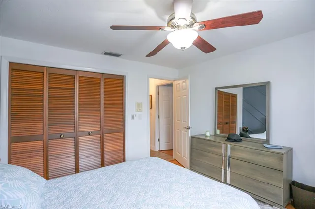 a bathroom with a toilet sink and shower