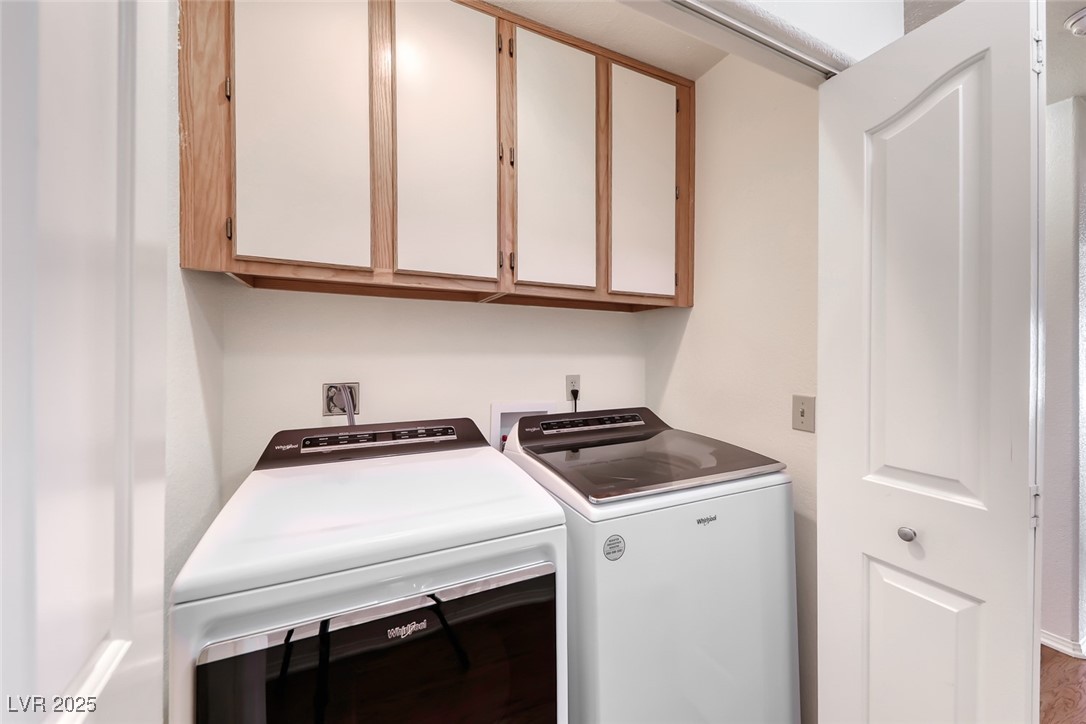 386 Nassau Way Boulder City, NV 89005 - Photo 33 of 44 Washroom featuring cabinet space and washing machine and clothes dryer