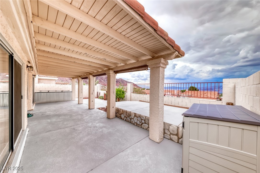 386 Nassau Way Boulder City, NV 89005 - Photo 9 of 44 Fenced backyard with a patio
