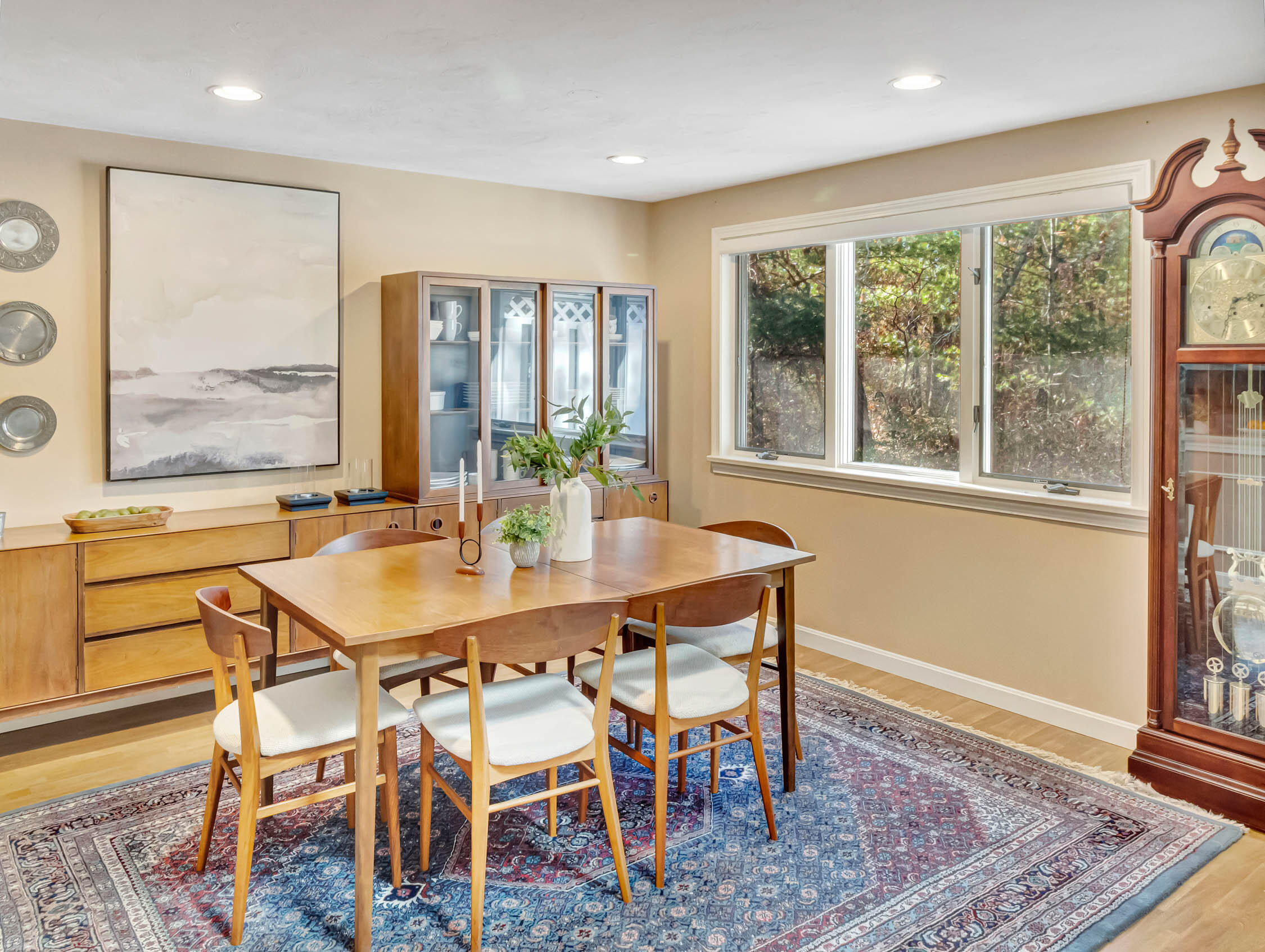 10 Kettle Lane Mashpee, MA 02649 - Photo 9 of 31 a view of a dining room with furniture large windows and wooden floor