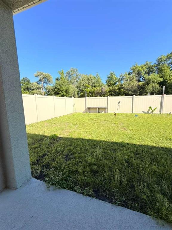 2518 Trinidad Road Haines City, FL 33844 - Photo 14 of 17 a view of a large pool with a yard