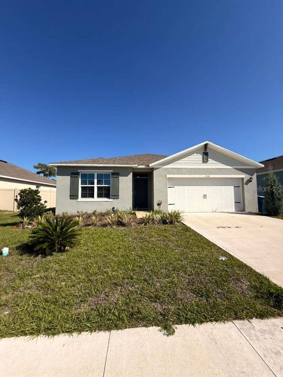 2518 Trinidad Road Haines City, FL 33844 - Photo 2 of 17 a view of a house with backyard