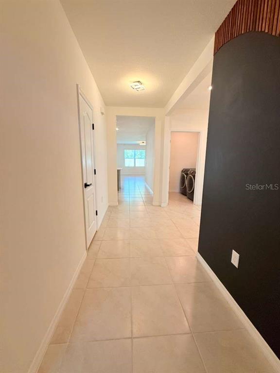 2518 Trinidad Road Haines City, FL 33844 - Photo 4 of 17 a view of a big room with entryway and a livingroom