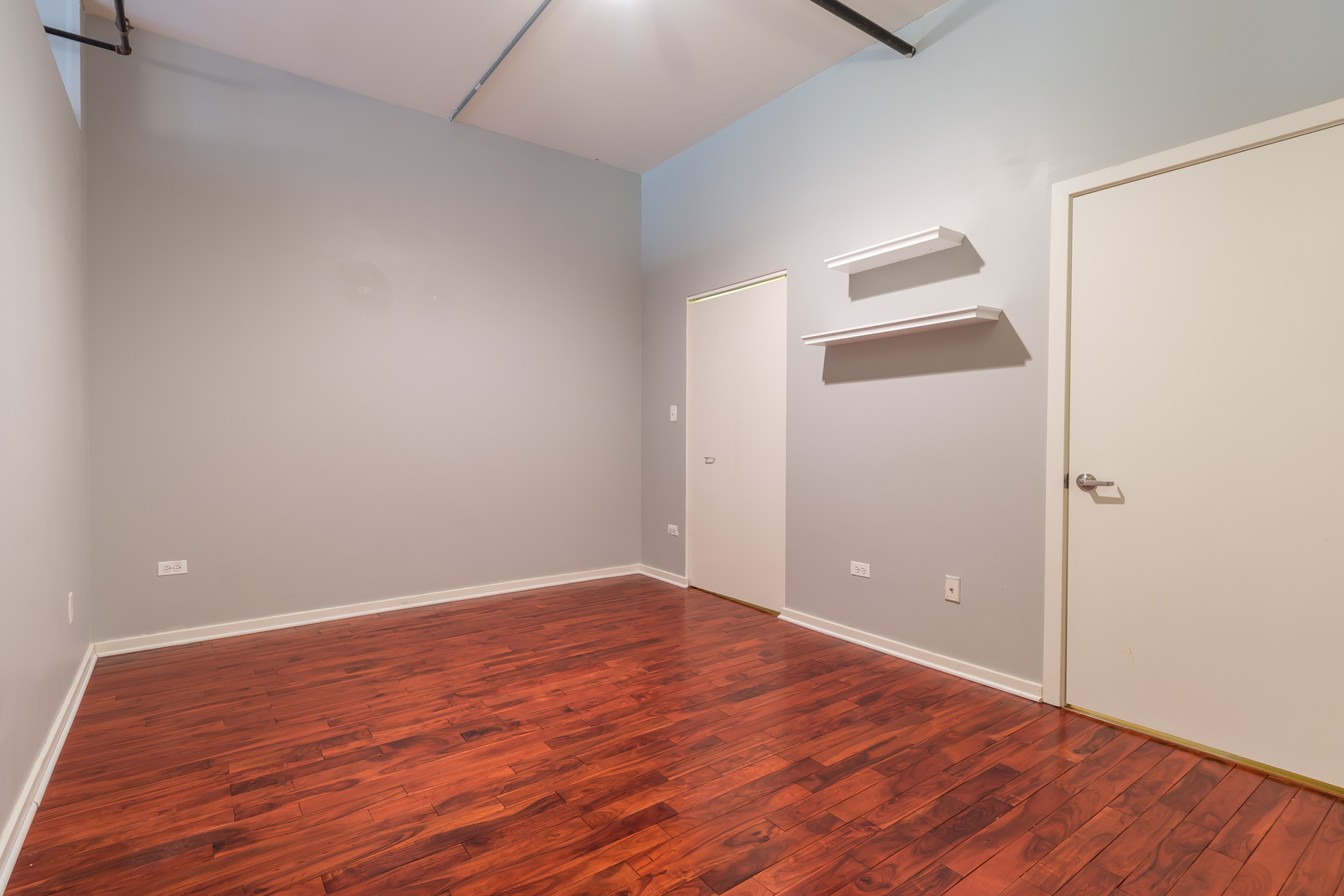 520 South State Street, Unit 1403 Chicago, IL 60605 - Photo 9 of 19 a view of empty room with wooden floor