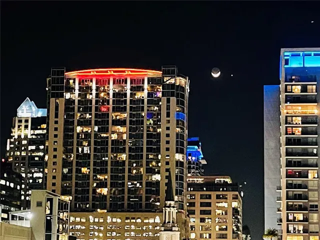 a view of a building with trees
