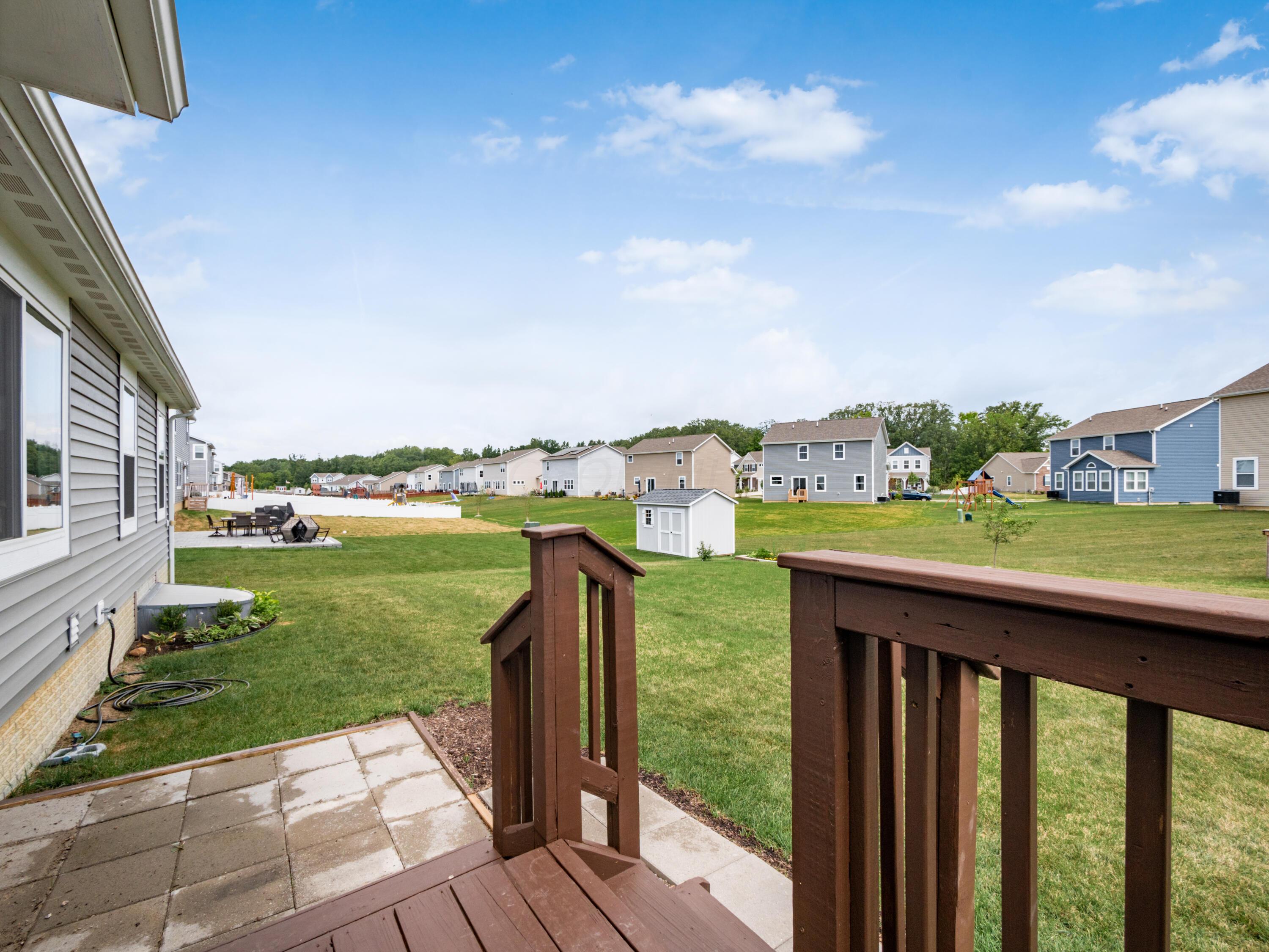 489 Randall Road Delaware, OH 43015 - Photo 33 of 35 Deck and patio off eat-in-kitchen space