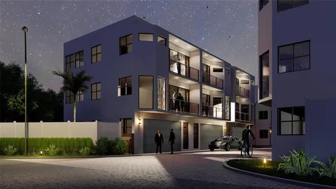 a front view of a building with street view