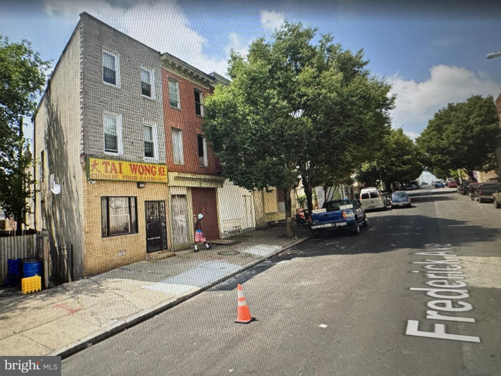 a view of a street with cars