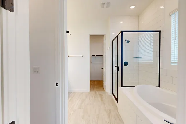 a bathroom with a sink vanity and mirror