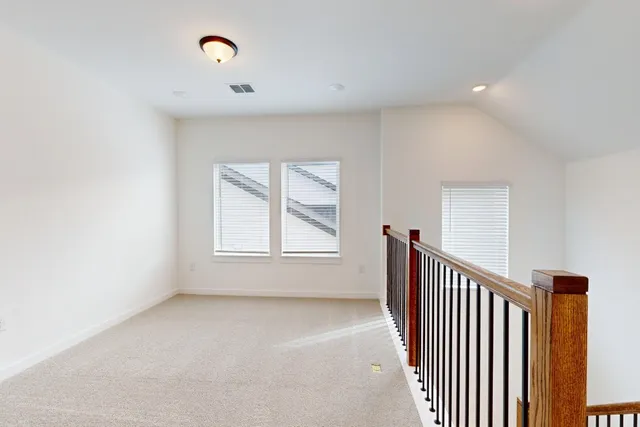 a view of an empty room and window