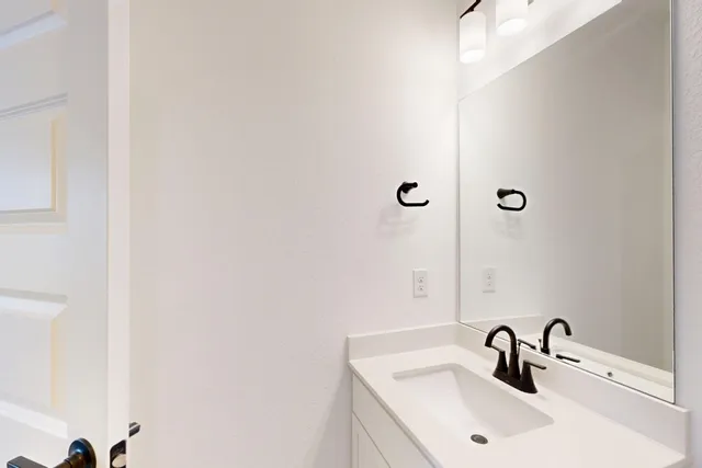 an empty room with closet area