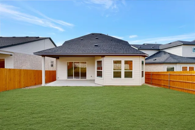 a picture of a book and a bed