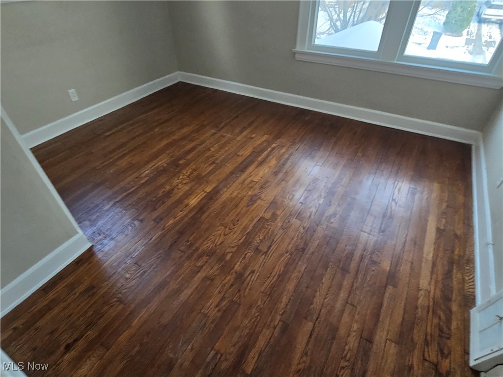 2048 Rossmoor Road Cleveland Heights, OH 44118 - Photo 25 of 29 Empty room with dark wood-style floors