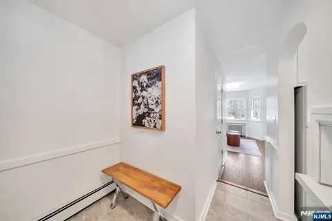 a view of an entryway with wooden walls