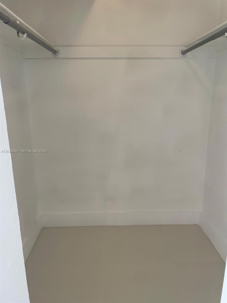 14170 Southwest 84th Street, Unit 402F Miami, FL 33183 - Photo 28 of 36 Walking Closet