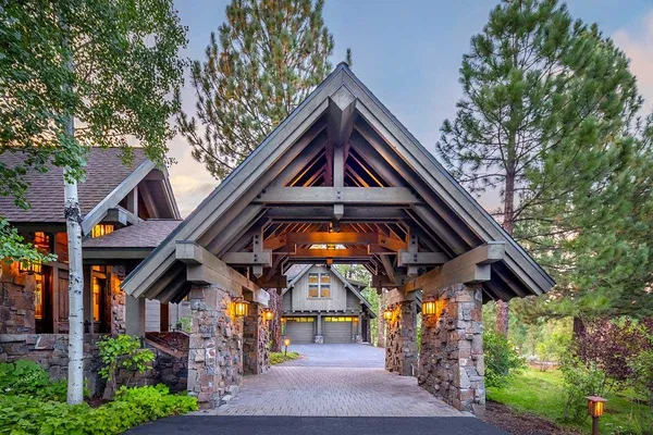 an aerial view of a house with a trees