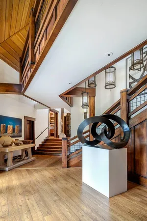 a kitchen with stainless steel appliances kitchen island a stove and a cabinets