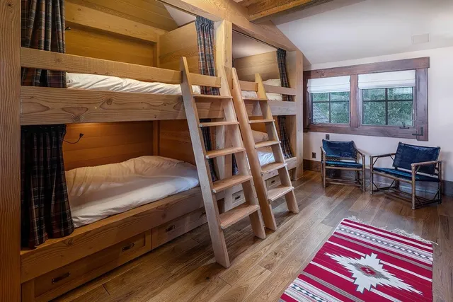 a room with furniture and a rug