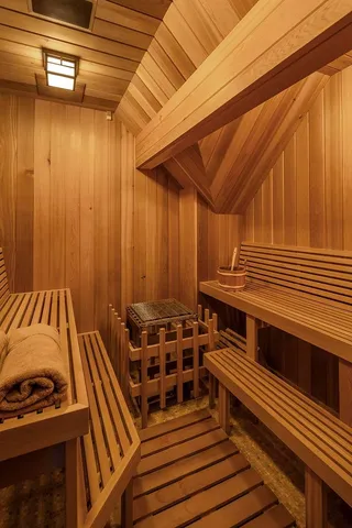 a view of a balcony with two windows