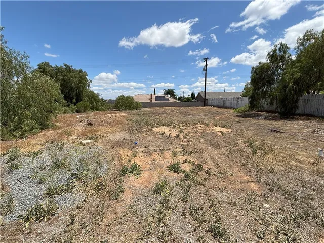 a view of a backyard of a house