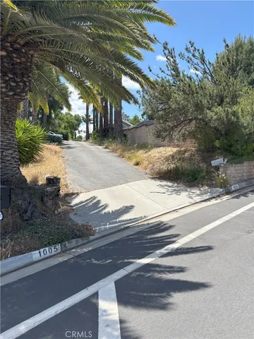 a view of road with house