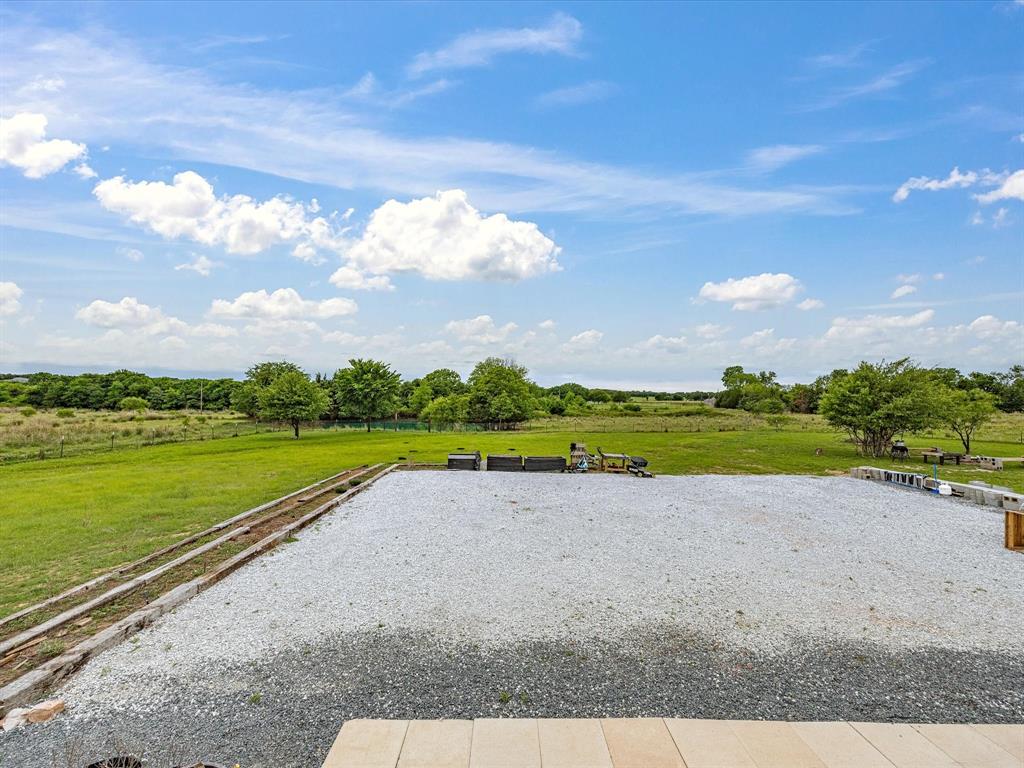 466 Belcher Road Bowie, TX 76230 - Photo 31 of 40 a view of a golf course with an ocean