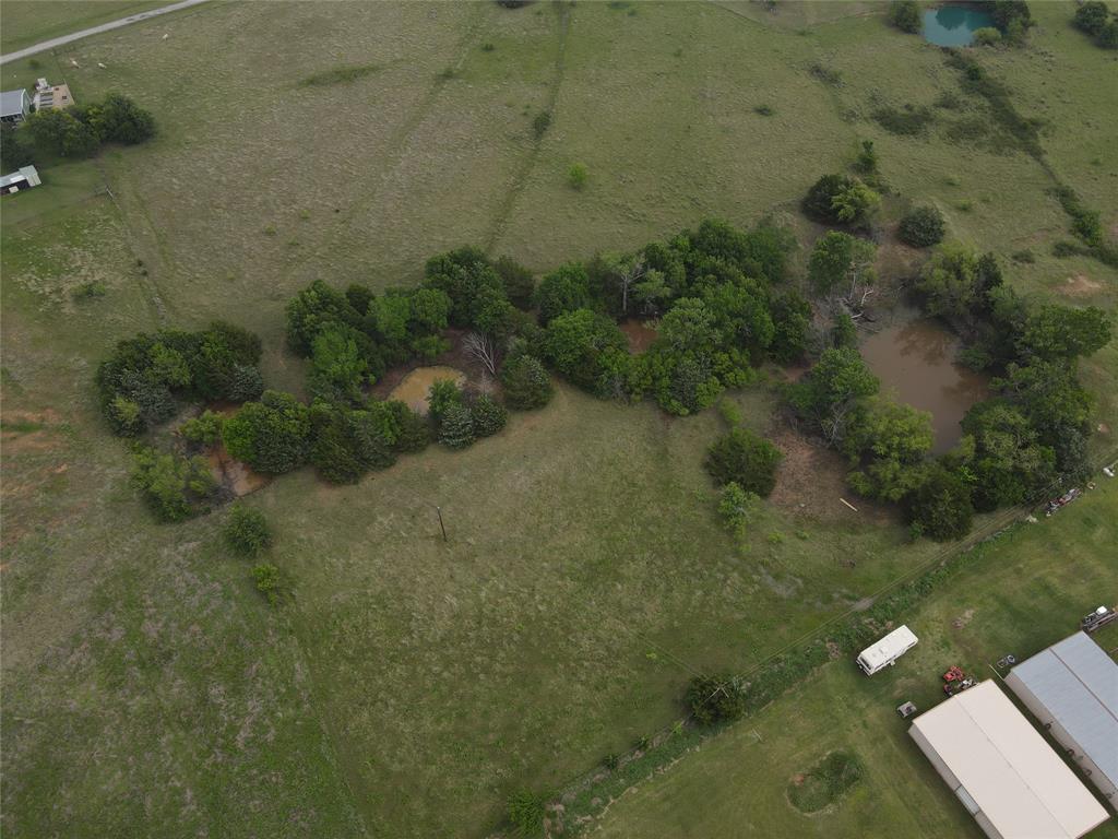 466 Belcher Road Bowie, TX 76230 - Photo 38 of 40 a view of a small yard