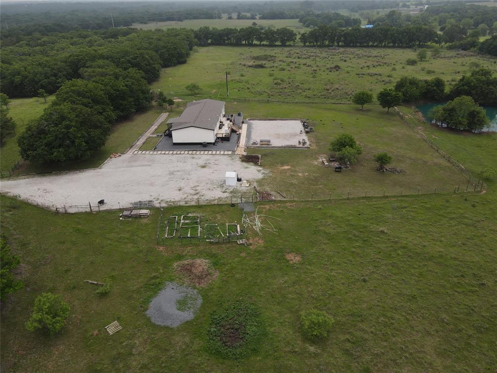 466 Belcher Road Bowie, TX 76230 - Photo 6 of 40 a view of a lake with outdoor space