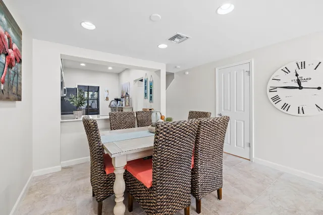a view of a dining room with furniture
