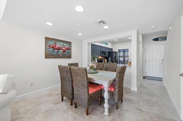 a view of a dining room with furniture