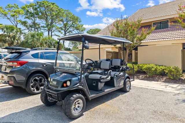 a car parked in front of a house