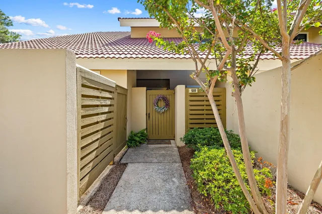 a front view of a house with stairs