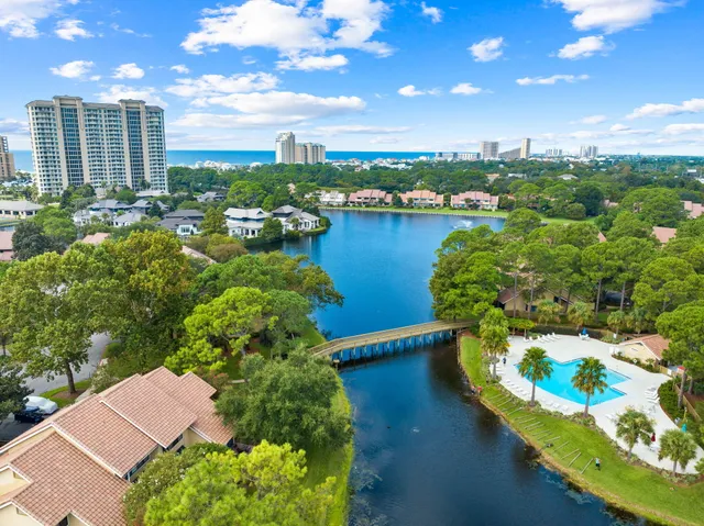 a view of a lake with a city