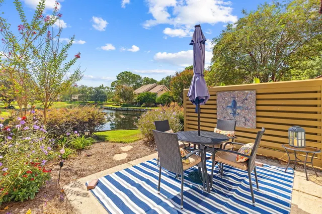 a view of a chairs and table on the terrace