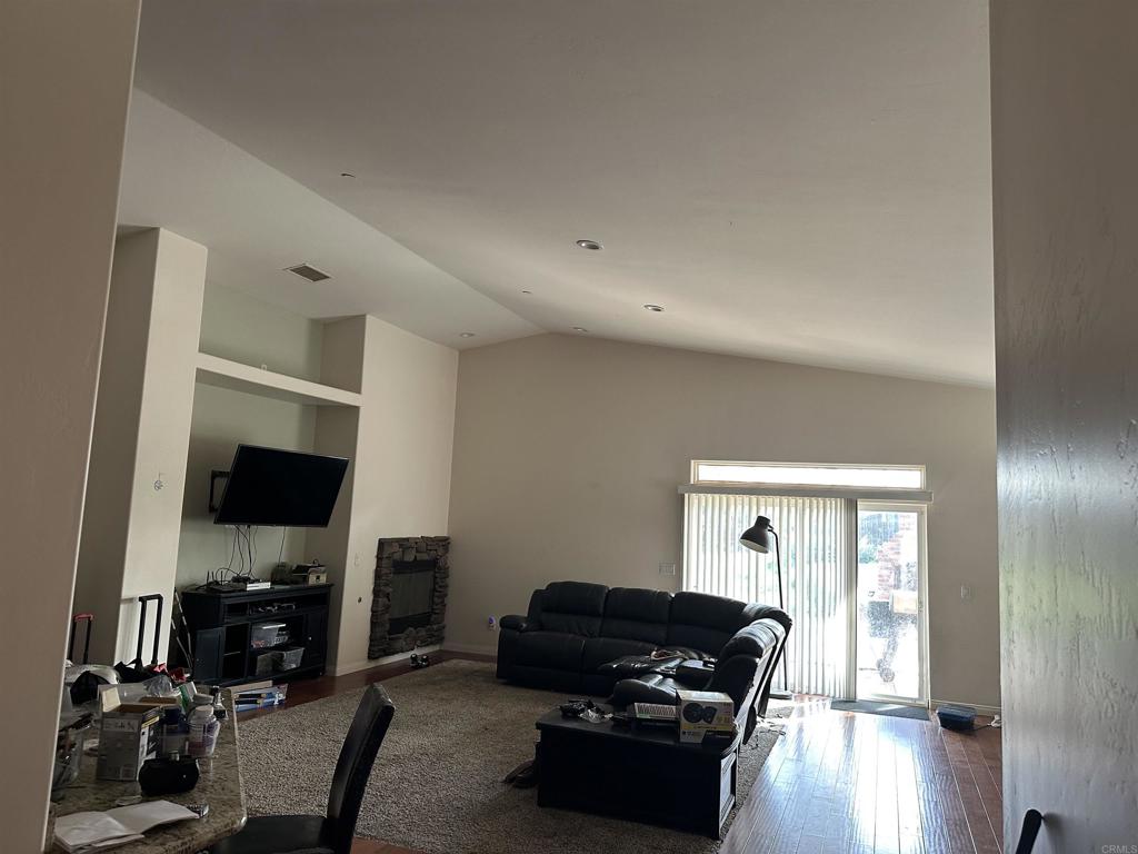13907 Maxfield Road Jamul, CA 91935 - Photo 18 of 32 a living room with furniture and a flat screen tv