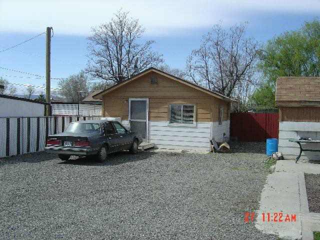 9860 Lateral A Road Wapato, WA 98951 - Photo 4 of 8 a view of a house with a patio