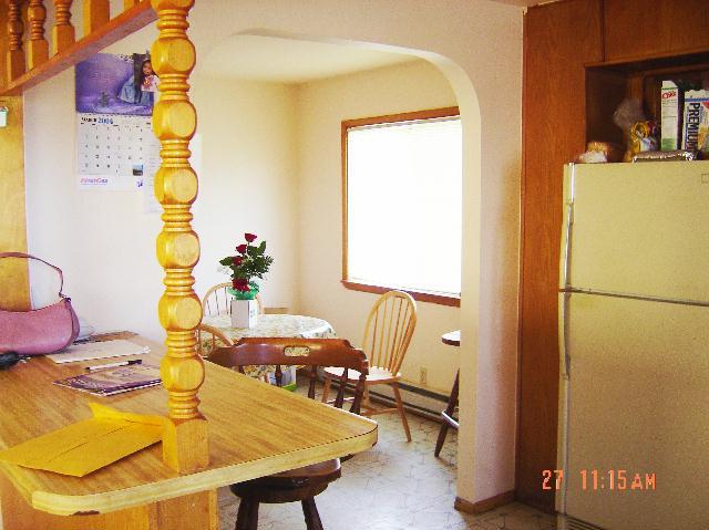 9860 Lateral A Road Wapato, WA 98951 - Photo 5 of 8 a view of a dining room with furniture