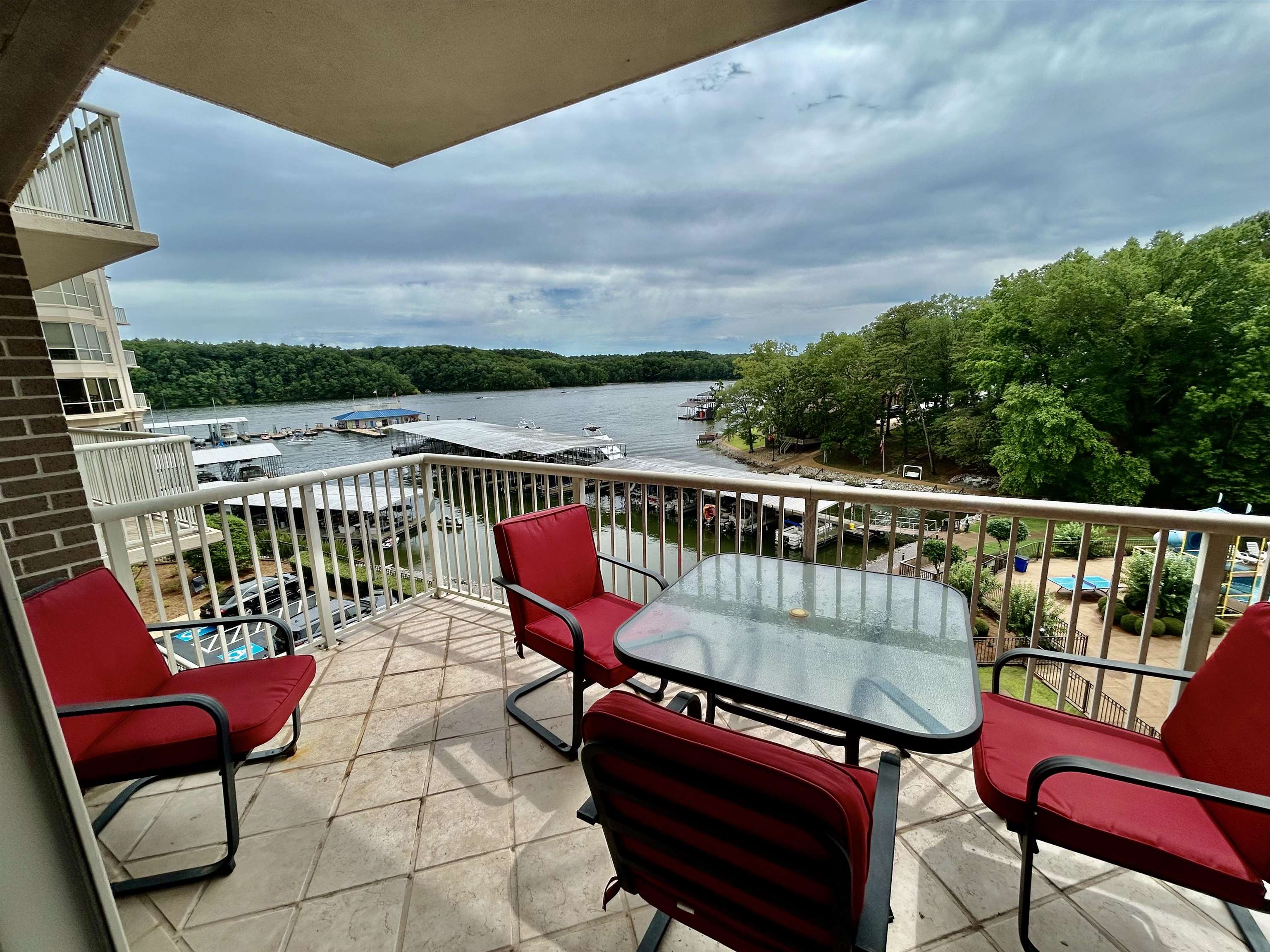 380 Rd Iuka Ms 38852, Unit P 402 Iuka, MS 38852 - Photo 16 of 25 a roof deck with a couple of chairs