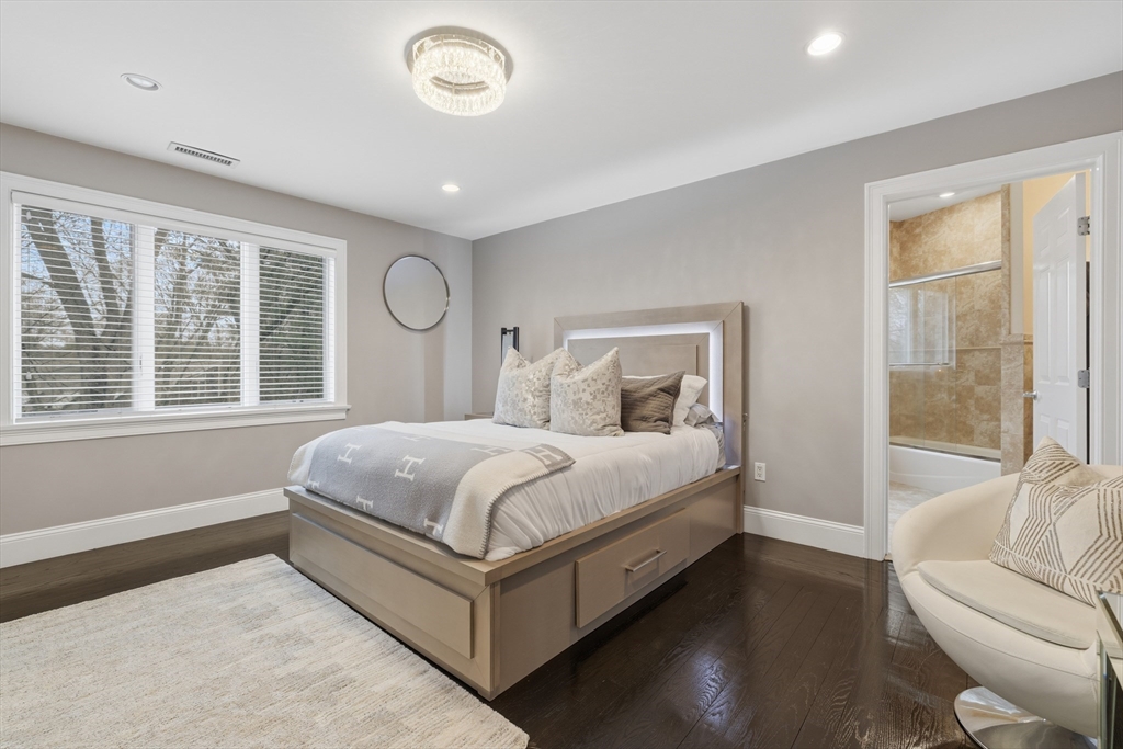 7 Freeman Street Lynnfield, MA 01940 - Photo 19 of 39 a bedroom with a large bed and a large window