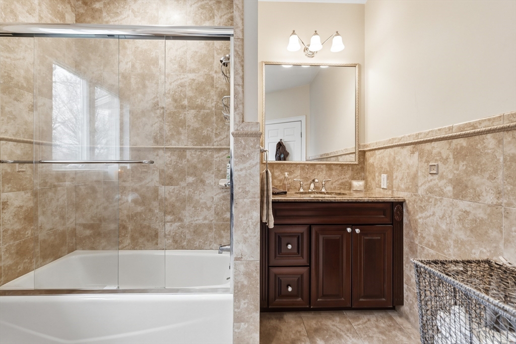 7 Freeman Street Lynnfield, MA 01940 - Photo 20 of 39 a bathroom with a sink and a bathtub