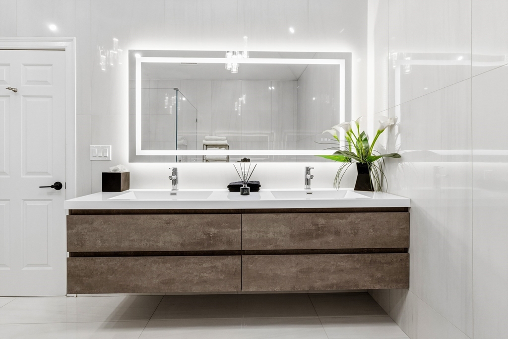 7 Freeman Street Lynnfield, MA 01940 - Photo 23 of 39 a bathroom with a sink and a mirror