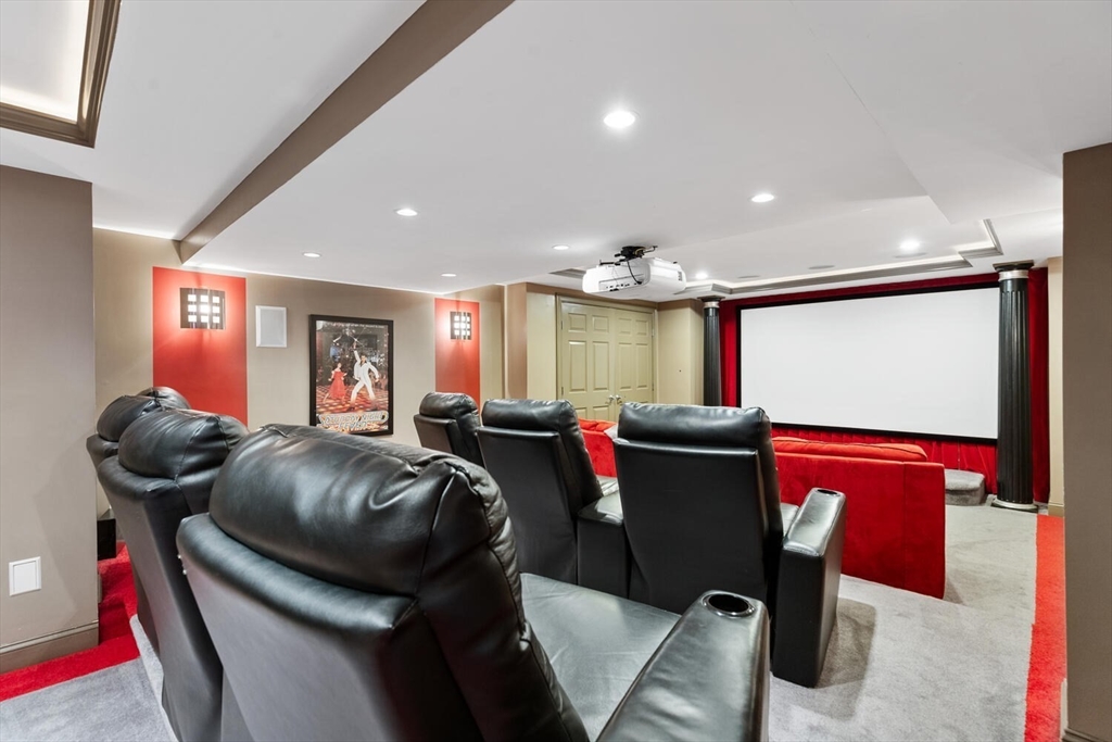 7 Freeman Street Lynnfield, MA 01940 - Photo 28 of 39 a living room with furniture a projector and screen