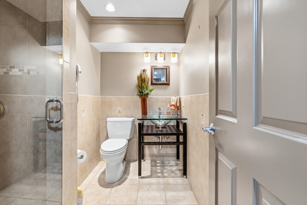 7 Freeman Street Lynnfield, MA 01940 - Photo 29 of 39 a bathroom with a toilet sink and shower