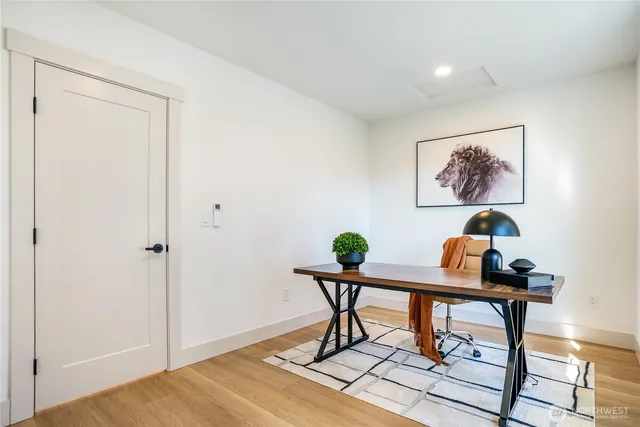 a bedroom with a bed and a couch