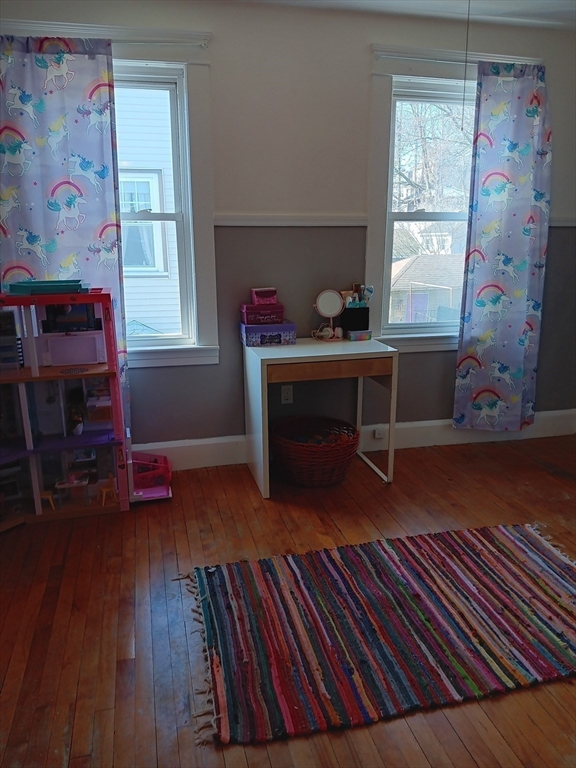 28 Barnard Road Worcester, MA 01605 - Photo 14 of 20 a view of a workspace with furniture and a window