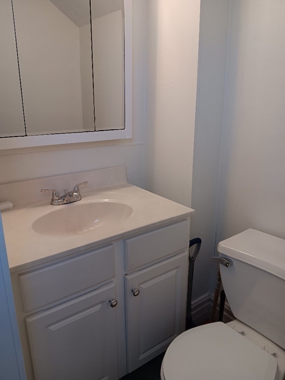 28 Barnard Road Worcester, MA 01605 - Photo 7 of 20 a bathroom with a sink toilet and vanity