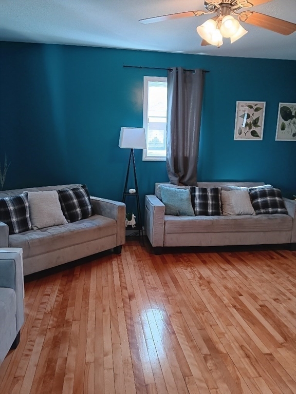 28 Barnard Road Worcester, MA 01605 - Photo 9 of 20 a bedroom with a bed and wooden floor